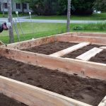 2016-06-11 Ned assembles new garden beds.54