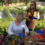 Bonnie & Kelly at picnic table by Irina