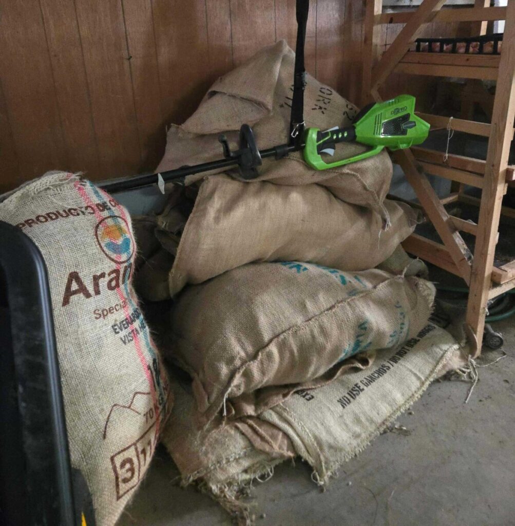 Coffee bags stuffed into four coffee bags in a garage